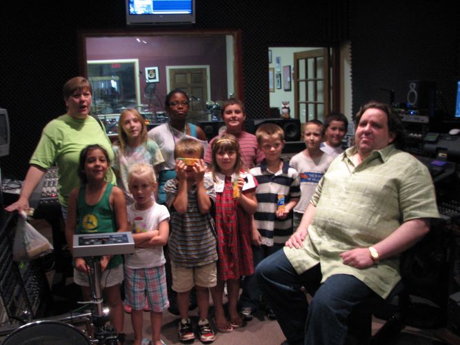 Joey Stuckey with students in studio 10